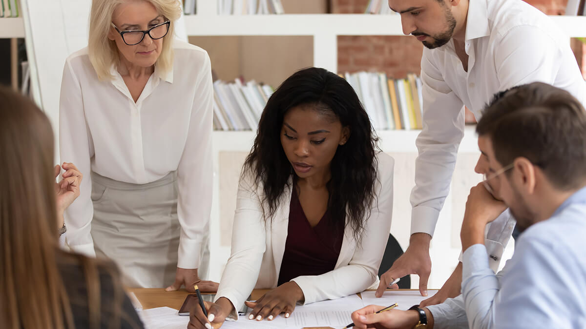 School administrator working on a laptop